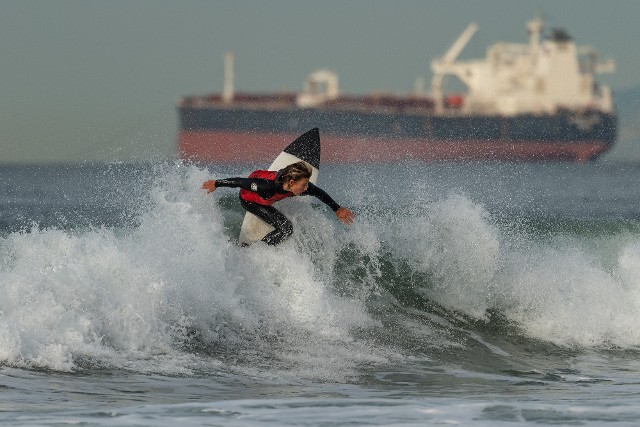 Dylan Morrisroe Surfing Backside Top Turn in Manhattan Beach
